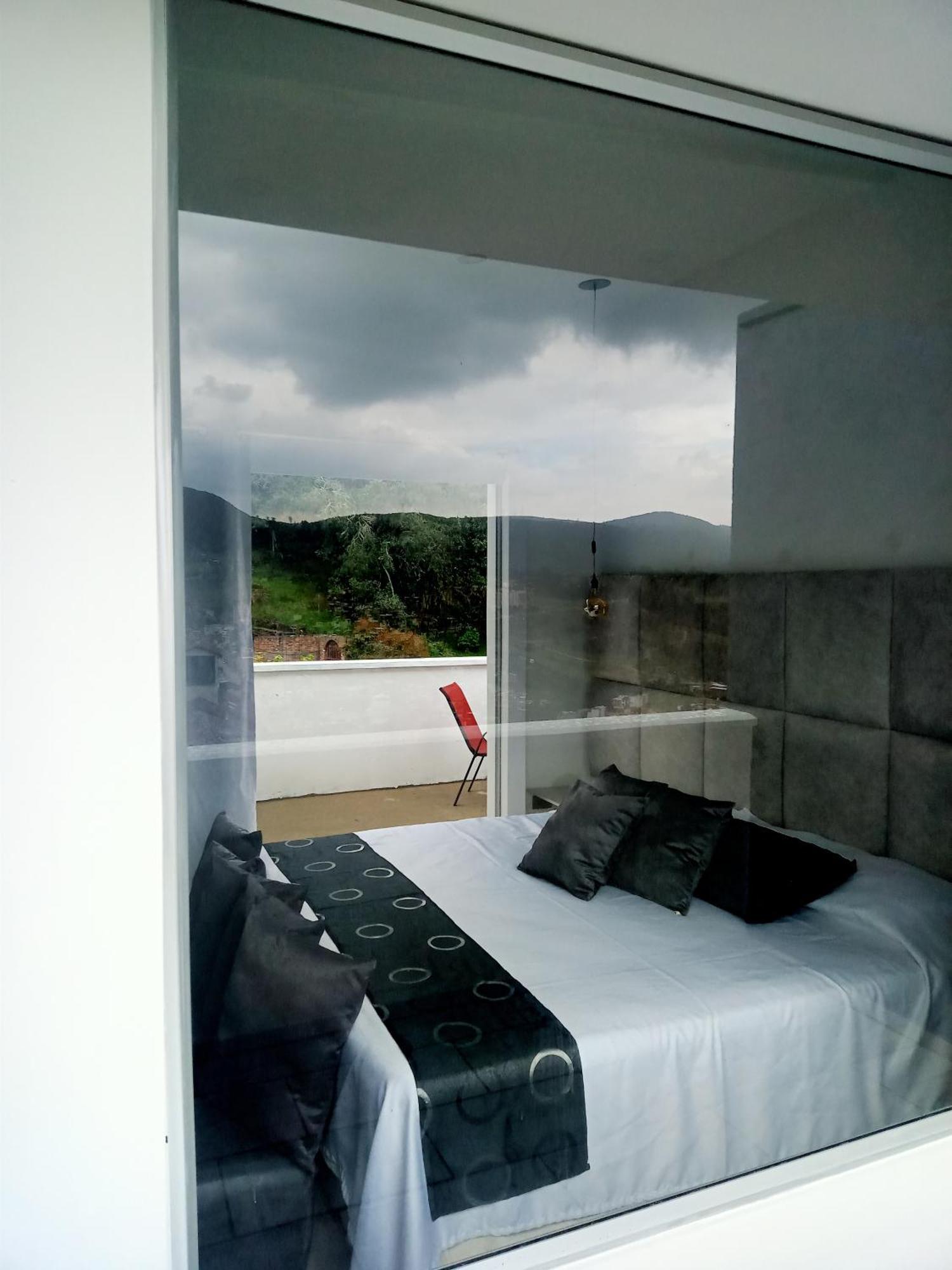 Penthouse Mirador Samsara Bed & Breakfast La Calera Exterior photo
